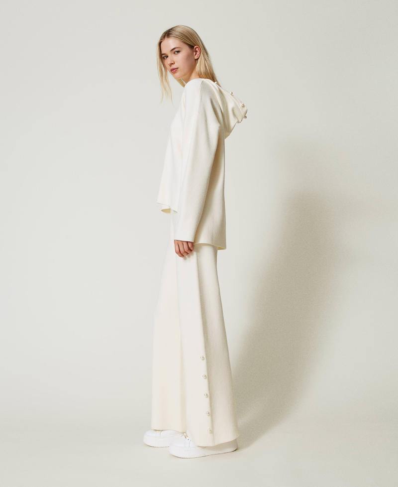 Scee by twin set Pantaloni wide leg in maglia con perle Ultimo giorno
