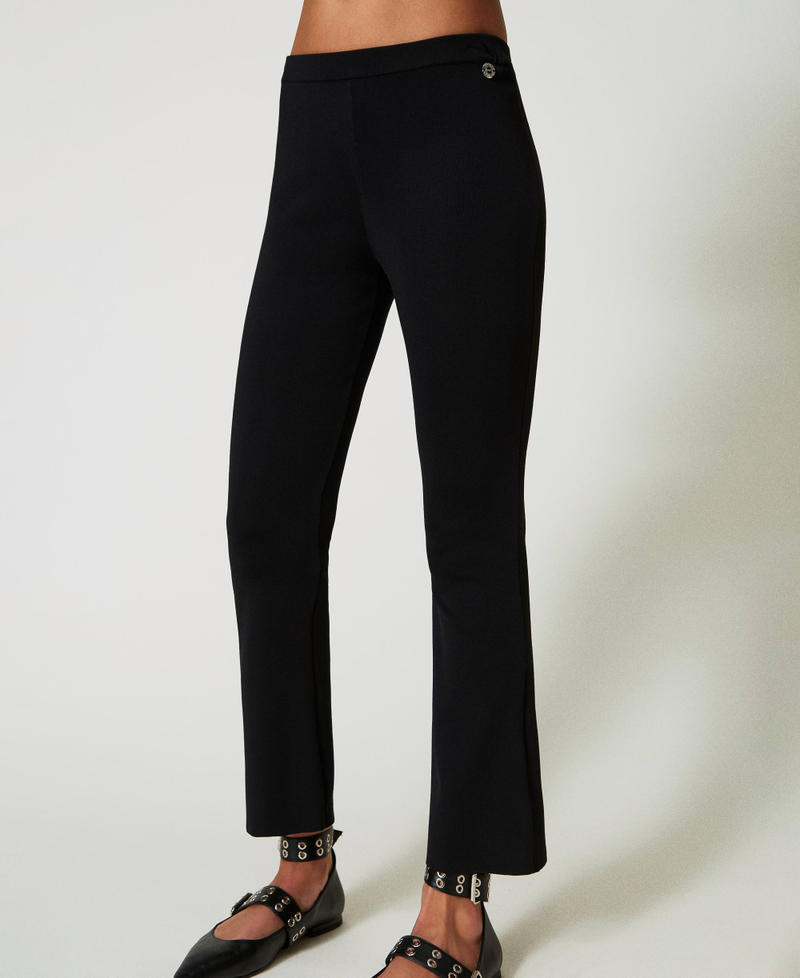 Scee by twin set Pantaloni flare in maglia Sconto