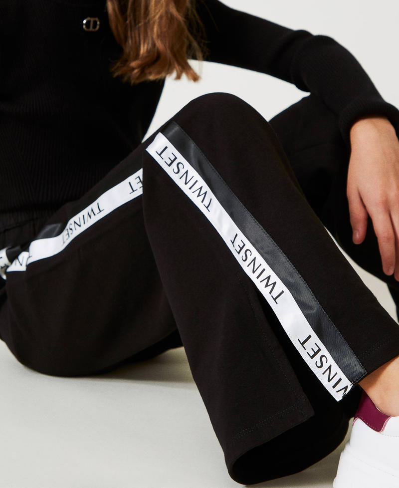 Scee by twin set Pantaloni a palazzo in felpa con logo Outlet