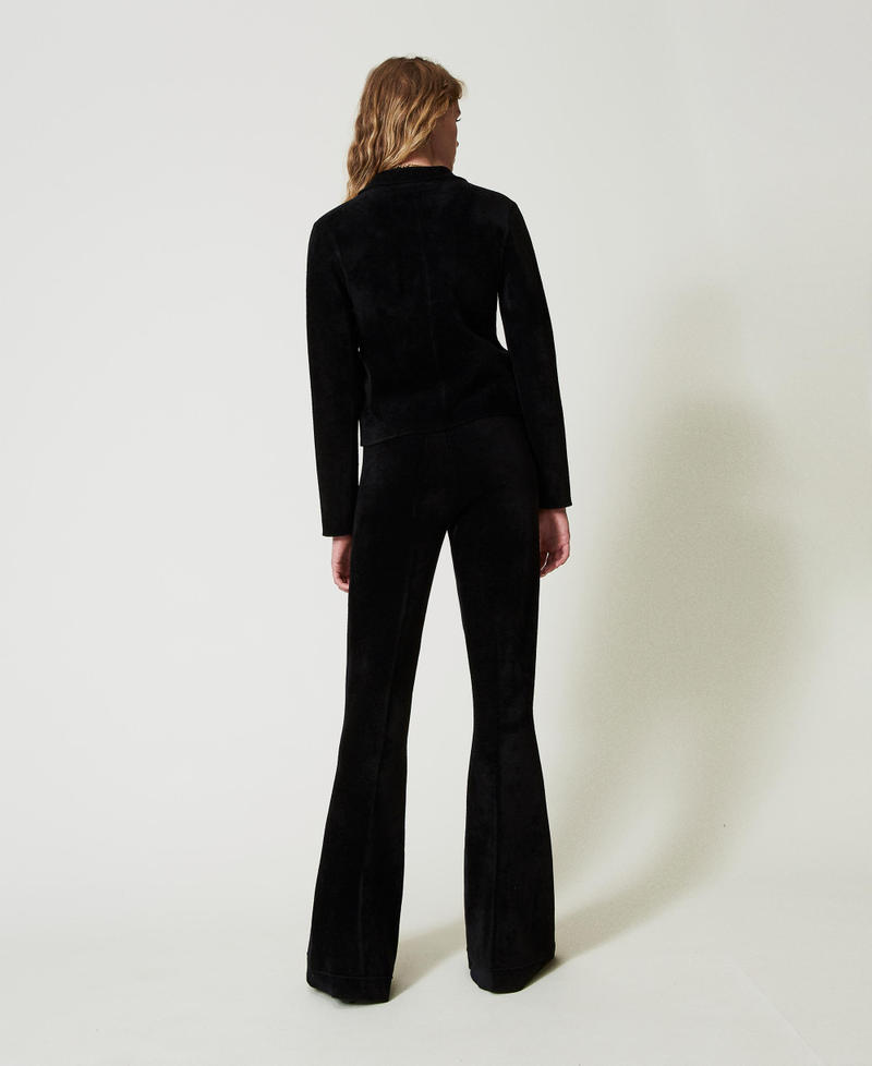 Scee by twin set Pantaloni flare in maglia con bottoni Oval T Nuova