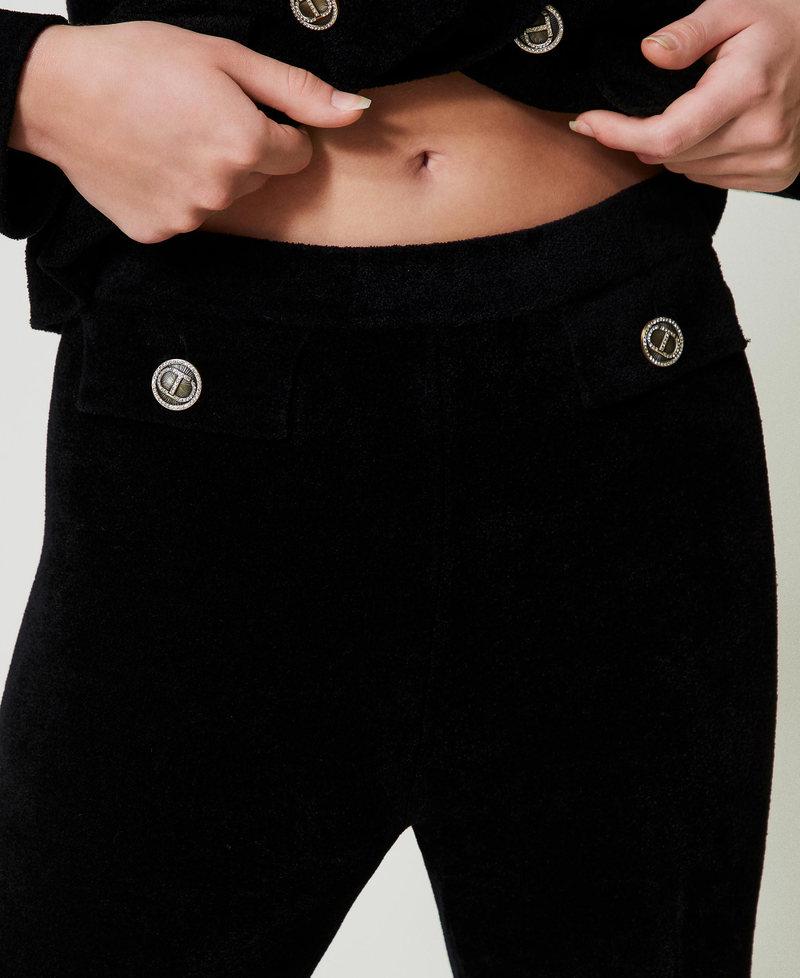 Scee by twin set Pantaloni flare in maglia con bottoni Oval T Nuova